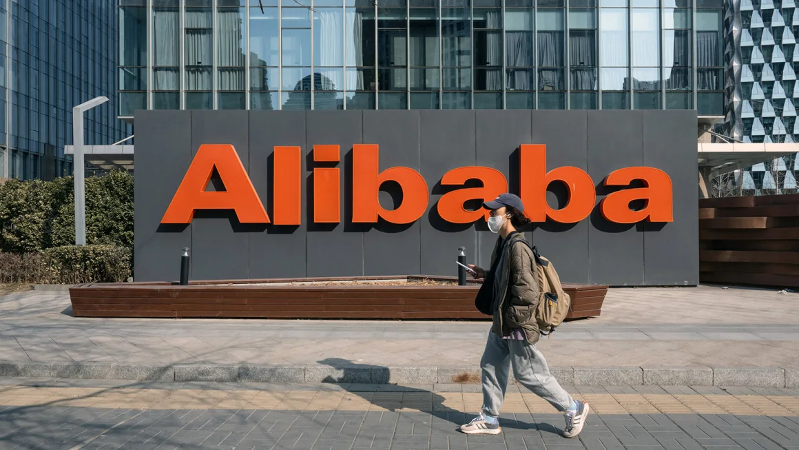 Alibaba shares sink after it shelves IPO plans for two units